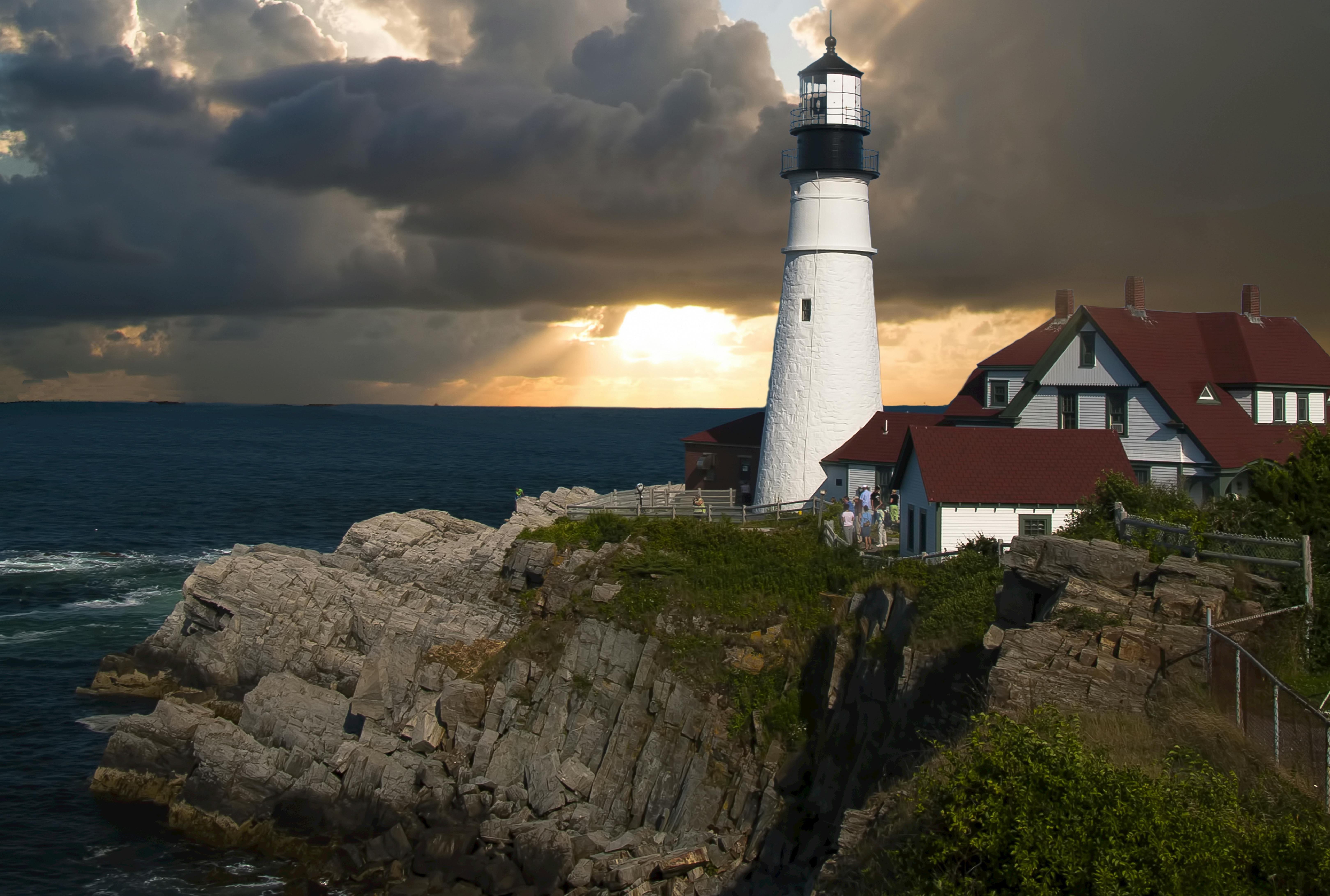 Rocky Maine beach with lighthouse